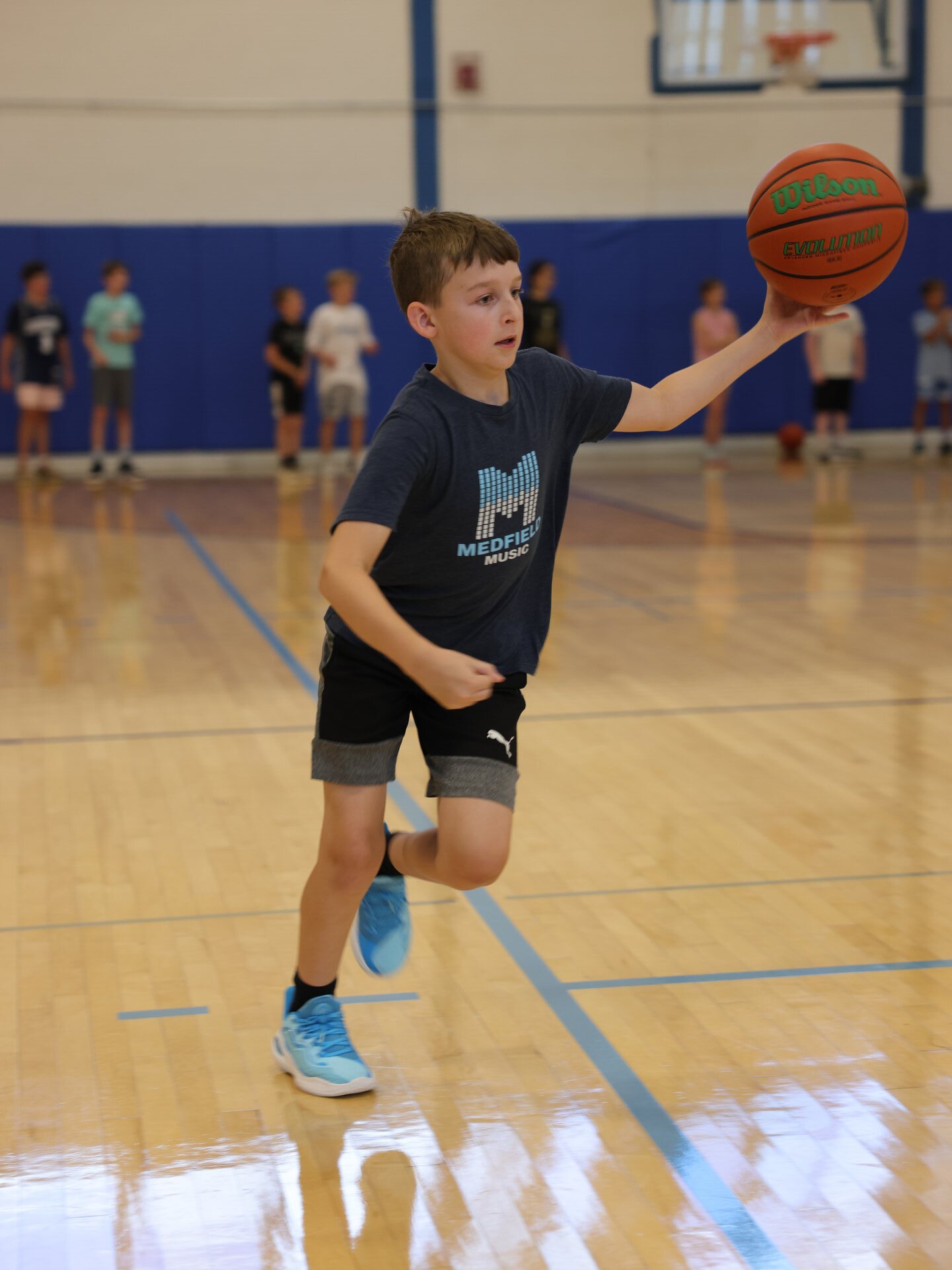 Boston Elite youth basketball camp — coaches mentoring young athletes